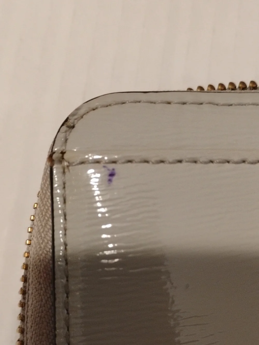 kate spade Beacon Court Nisha Wallet. Patent Leather. Light Gray in color.
